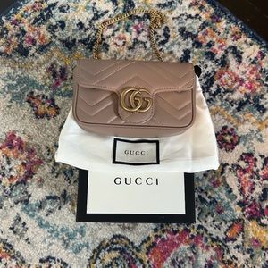 Authentic Gucci GG Marmont Super Mini Handbag.